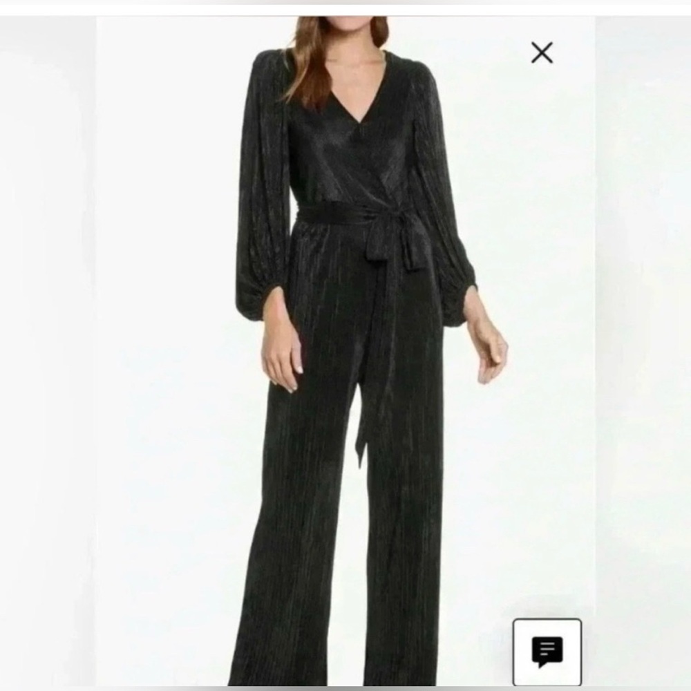 Eliza J. Long Sleeve Open Back Metallic
Black Jumpsuit